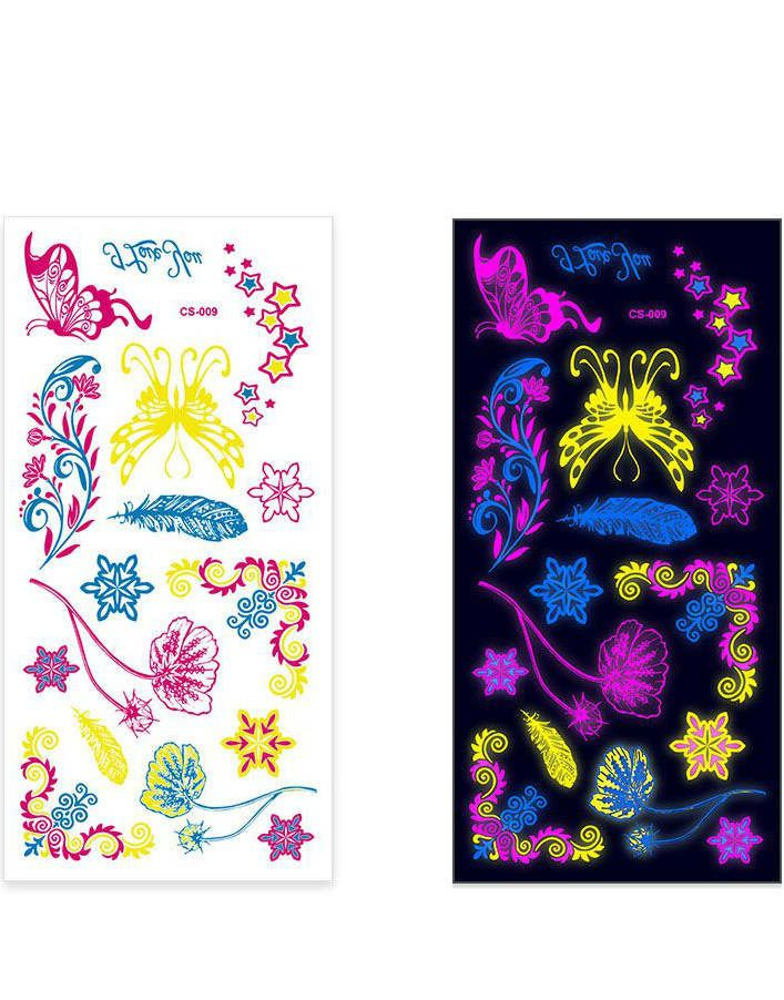 Ark med Fluorescerande Fjärilar, Blommor, Snöflingor och Andra Tatueringar